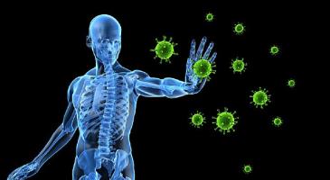 Transparent human figure in blue on black background, arm outstretched to ward off coronavirus spores in green