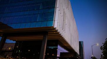 Photo of the Hans Rosling Center Building at night