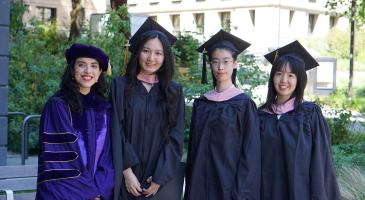 Group photo of four UW Biostatistics student graduates, 2024