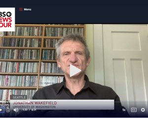 Screenshot of Jon Wakefield being interviewed on PBS News Hour