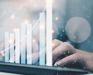 Concept photo of person typing on compute with data analysis graph overlap