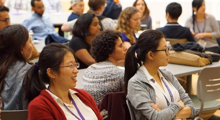 Attendees of Summer Institutes listening to presentation