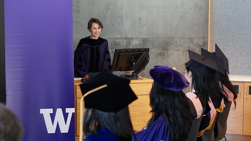 Amy Willis delivering graduation address at 2024 UW Biostatistics department ceremony